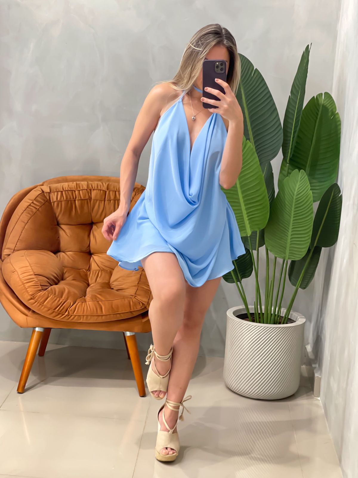 Conjunto em Crepinho Blusa Gola Boba e Shorts Saia